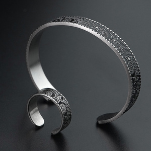 Ensemble de bijoux vintage : Bracelet étoile à cinq branches élégant en acier inoxydable sterling, manchette tendance pour hommes et femmes, bague jonc - Product Image 1