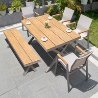 Moderner Outdoor-Terrassentisch mit Stühlen, Neue WPC-Kunststoff-Holz-Tischplatte mit Metallrahmen für Hotel-Innenhof, Garten, Essen und Feiern