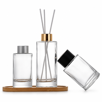 Ensemble de 3 flacons diffuseurs de parfum vides en verre transparent avec plateau en bois et bouchons dorés, argentés et noirs