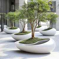 Fauteuil de repos en fibre de verre avec pot de fleurs intégré, design spécial pour centre commercial, mobilier de loisirs créatif d'extérieur
