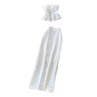 Ensemble deux pièces élégant pour femme : haut bustier peplum et jupe longue taille haute, coupe ajustée, idéal pour le quotidien