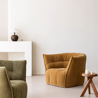Fauteuil individuel rembourré en tissu chenille moderne et confortable, garni d'éponge, sans structure, idéal pour appartement et hôtel