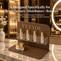 Support de présentation cosmétique moderne pliable en acrylique marron personnalisé avec 4 emplacements pour flacons de sérum et comptoirs de vente au détail de produits de beauté