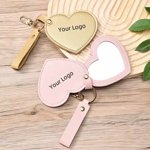 Custom Logo Label PU Leather Pocket Mirror Keychain Rotatable Heart Design Advertising Gift for Travel Promotional Mirrors