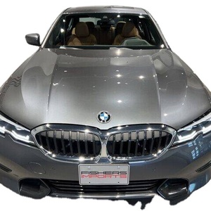 Offre Spéciale – BMW Série 3 330i d'occasion en excellent état, transmission intégrale, intérieur cuir foncé, régulateur de vitesse adaptatif (ACC), berline 4 portes avec barres de toit en aluminium à vendre - Product Image 1