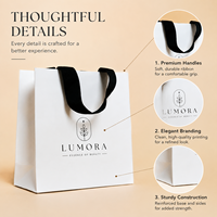 Sac en papier de luxe écologique et recyclable de qualité supérieure pour la vente au détail de mode, fabriqué en papier kraft, papier artistique, impression offset, dorure à chaud, UV
