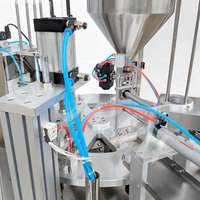 Machine de scellage entièrement automatique, pour le remplissage de petits gobelets à gelée