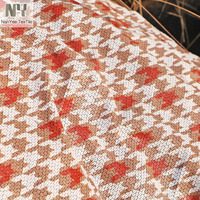 Tissu à paillettes Nanyee Textile populaire à imprimé hirondelles orange et blanches pour robe femme