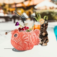 Tasse créative Tiki verre en céramique hawaïenne avec conception de poisson de lumière rouge de couleur personnalisée pour les cadeaux publicitaires et l'utilisation à la maison et à l'hôtel