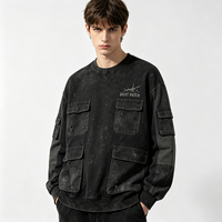 Sweat-shirt Crew Kornit DTG avec motif graphique de lettres minuscules effet craquelé sur la poitrine, poche multi-positions sur les manches, coupe ample, délavé, style grunge, haut décontracté