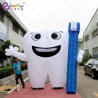 Ballon publicitaire géant gonflable personnalisé en forme de dents avec brosse à dents pour la promotion des cliniques dentaires