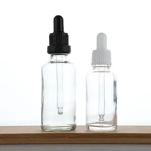 Flint uçucu yağ için cam damlalık şişe stok 5ml 10ml 15ml 20ml 30ml 50ml 100 Ml yuvarlak kare Amber mavi yeşil kozmetik 100 adet