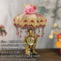 Lampe de table européenne ornée de sequins à imprimé floral avec base paon, horloge à pampilles en cristal rose pour chambre et salon