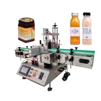 Machine d'étiquetage automatique pneumatique pour bouteilles/bocaux carrés avec moteur PLC pour une application d'étiquettes adhésives à haute productivité