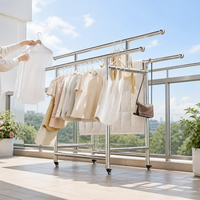 Porte-vêtements mobile à double rail en acier inoxydable sur roulettes avec rangement inférieur pour balcon