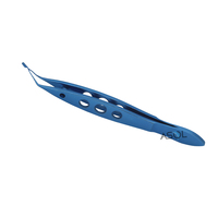 Instrument chirurgical pour la chirurgie oculaire : Pince à noyau à action croisée, à dents crantées et à mâchoires en forme de palette