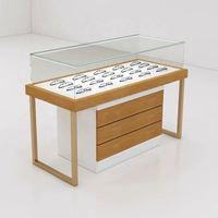 Présentoir élégant et moderne pliable pour lunettes de soleil et montures de lunettes avec fixation murale et installation sur comptoir