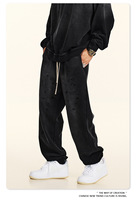 Pantalon de jogging unisexe imprimé effet éclaboussures, coupe fuselée, taille élastique avec cordon de serrage, poches latérales, bas de jambe à revers, style streetwear, effet vieilli, personnalisable, vente en gros