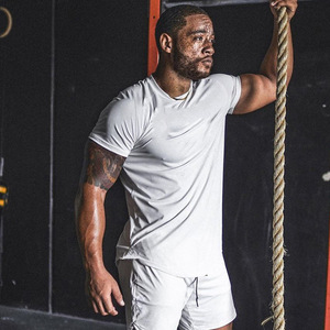 Maglietta sportiva sportiva da uomo stile Vintage allenamento Casual traspirante con manica corta colore puro dai fratelli Fitness muscolare - Product Image 3