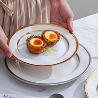 Assiettes de luxe en porcelaine pour hôtels, vaisselle en céramique, assiettes de restaurant en gros, service de vaisselle avec bord doré