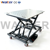 Table de soudage 3D avec élévateur à ciseaux hydraulique robuste pour changer facilement la hauteur de travail des structures en acier de grande hauteur