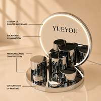 Présentoir pliable multi-niveaux en acrylique avec éclairage LED et miroir argenté pour comptoir, idéal pour sérums, crèmes et produits de beauté en magasin