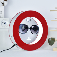 Expositor Magnético Flotante de Acrílico para Gafas en Forma Redonda Blanca, Soporte Levitante y Giratorio para Lentes de Sol y Publicidad