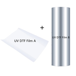 ฟิล์มยูวี DTF ซุปเปอร์คัลเลอร์ ขนาด 11.80 นิ้ว 30 ซม. แบบ PET A/B สำหรับรีดร้อนลงบนเสื้อผ้า แบบม้วนคู่ - Product Image 1