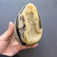 Vente en gros artisanat spirituel semi-précieux en forme d'œuf naturel noir jaune septum druzy crystal geode à vendre