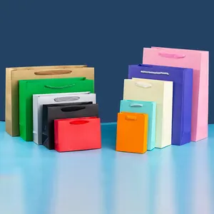 Benutzer definierte Luxus Handwerk Geschenk verpackung Einkaufs griff Tasche Kraft papier tragen Packt aschen mit Ihrem eigenen Logo