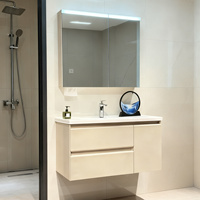 Kabinet kamar mandi Solid pemasangan dinding Modern dengan cermin pintar wastafel keramik penyimpanan ganda laci senyap untuk Hotel