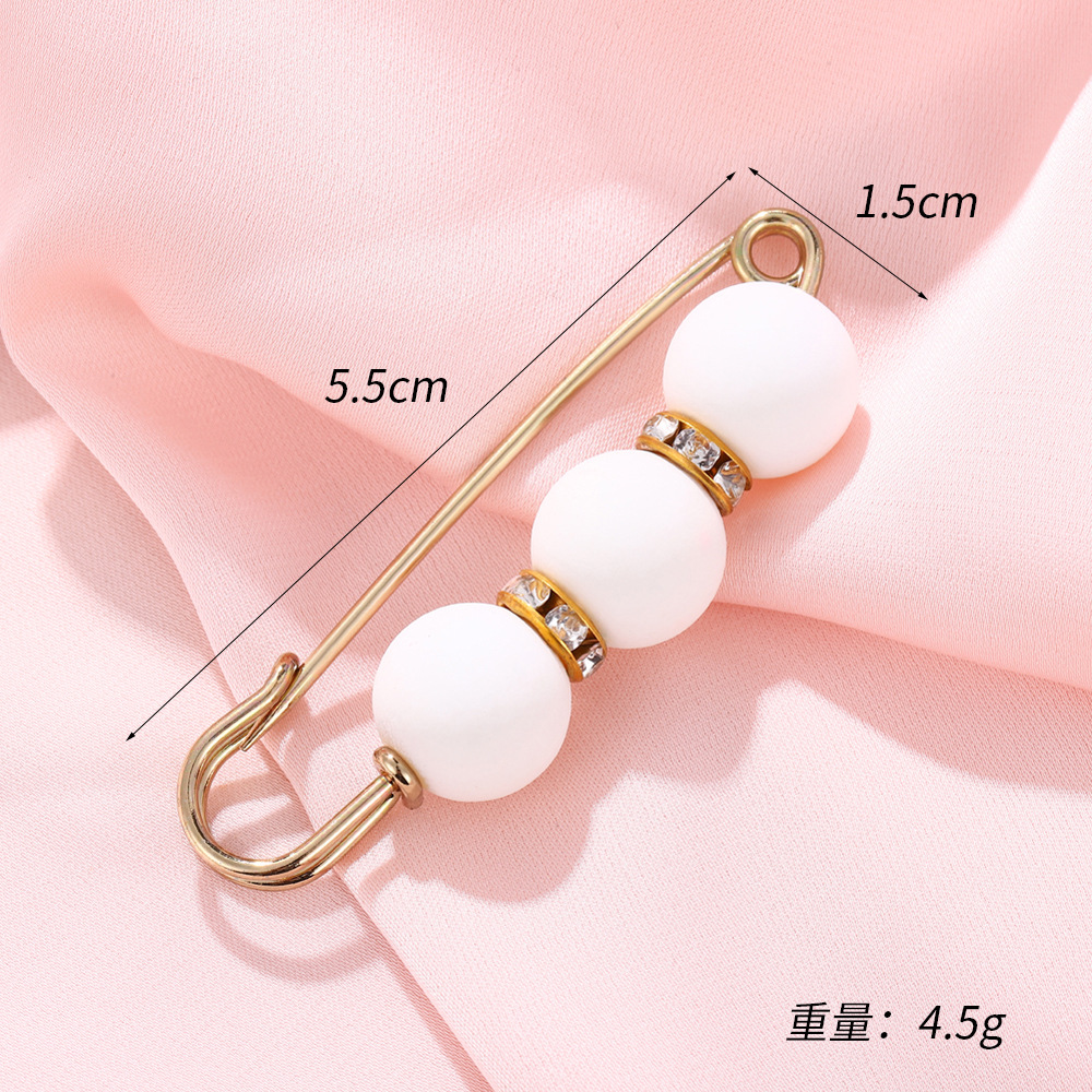 Trois perles avec deux diamants, blancs (5,5*1,5CM)