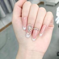 Uñas postizas al por mayor, color rosa nude, con punta francesa, pedrería 3D, largas, tipo ataúd, de ABS, reutilizables, OEM, personalizadas
