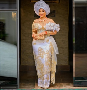 Verified Supplier Gold African Wedding Dress High-Quality Swiss Voile Lace  | Alibaba.com