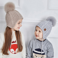 Usine Enfant Filles Garçons Hiver Tricot Chaud Bonnet Enfants Garçons Oreille Rabat Pompon Chapeau Enfants Logo Personnalisé Doublure Polaire Chapeau