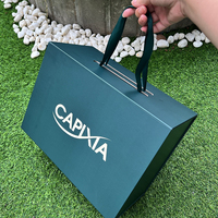 Boîtes en carton pliables de luxe vert foncé avec fermeture magnétique pour emballage de vêtements, faible MOQ en stock