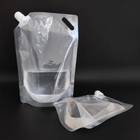 Vente en gros de sachets de boisson en plastique transparent de 4 oz (100 ml) avec bec verseur et bouchon