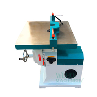 Machine à profiler et à cisailler le bois avec table inclinable et orientable à 45 degrés
