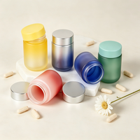 Flacon de complément alimentaire en verre givré multicolore personnalisé avec couvercle en métal électroplaqué pour l'emballage de vitamines et d'aliments santé