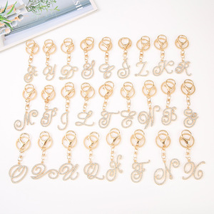 Porte-clés en alliage de zinc tendance, style européen, 26 lettres anglaises, strass, pendentif pour sac, breloques - Product Image 1