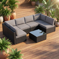 Ensemble de canapés modulaires d'extérieur en rotin PE, en forme de L, avec coussins bleu marine et table basse en verre, 5 pièces