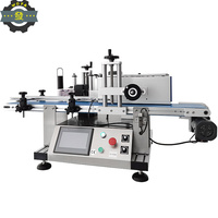 Machine d'étiquetage de bouteilles cylindriques électrique compacte de comptoir avec moteur pour l'emballage de cosmétiques, de boissons, de sacs, de cartons et de barils