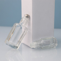 Conception irrégulière 3ml 6ml 12ml bouteille d'huile de parfum personnaliser bouteille de parfum unique bouteille de luxe ronde