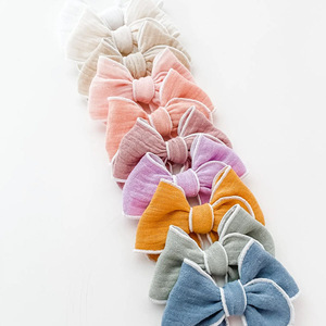 Fascia per <span class=keywords><strong>capelli</strong></span> in cotone tinta unita per neonati e bambini, stile europeo e americano, con fiocchi, confezione in cartone, per tutte le stagioni, per mantenere la bellezza. - Product Image 1
