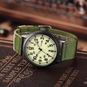Montre de sport pour homme avec mouvement à quartz analogique, boîtier rond, bracelet en nylon vert, marquages 24 heures - Product Image 3