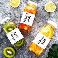 Vente en gros, carré écologique Simple 12 oz 16 oz bouteilles d'infusion à froid café jus lait bouteille en verre avec bouchon d'étanchéité