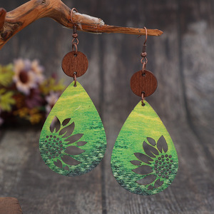 Pendientes colgantes vintage con forma de gota de girasol para mujer, joyería hueca de doble cara estilo madera - Product Image 3