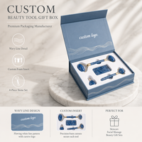 Boîte cadeau rigide à couvercle magnétique avec logo personnalisé, insert en mousse et compartiment découpé pour l'emballage d'outils de beauté et de soins de la peau