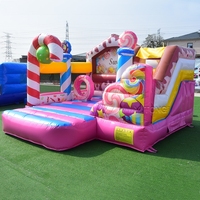 Château gonflable commercial de bonne qualité rose bonbon avec toboggan intégré pour enfants, idéal pour la location événementielle en extérieur