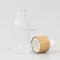 Parfum cosmétique couvercle en bois véritable 5ml 10ml 15ml 20ml 30ml 50ml 100ml flacon compte-gouttes en verre de pipette transparente d'huile de sérum avec bouchon en bambou